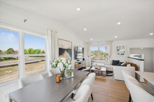 Watch TV, cook or enjoy breakfasts here in your new living space *Photo of actual home