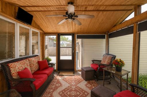 Screen porch w/floor to ceiling shades & ceiling fan
