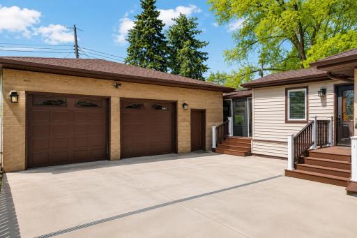 Garage area with doors into the home & cedar screened porch