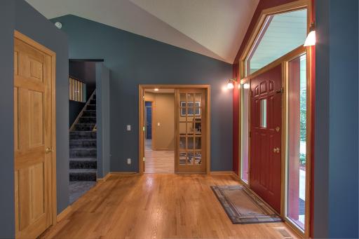 Front door and entrance to office with french doors and front sitting room.