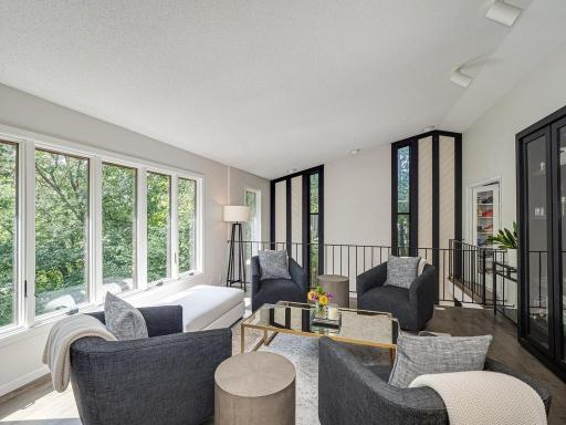 A superb area to just relax on the main floor with more of the beautiful and peaceful views of nature.