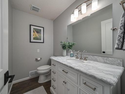 This updated bath with a new vanity (2022) is next to the office\fourth bedroom.
