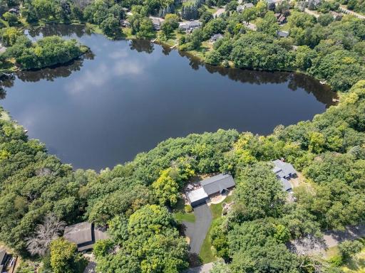 Location-- location-- location is a saying you have always heard when talking about real estate. This property is location--location--location and location. Hard to believe that this up north setting is only two miles away from Ridgedale.