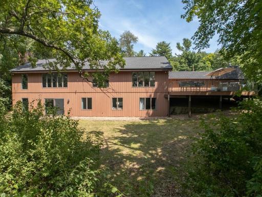 And amidst all of the trees the walkout level leads to a rear yard that is bigger than you expected.