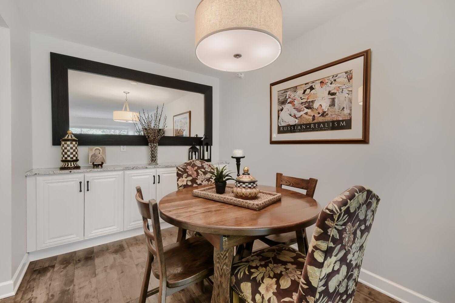 Built in buffet for extra storage with granite counter top.