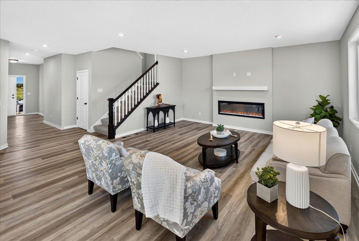 PHOTO OF A DIFFERENT HOME WITH SIMILAR PLAN AND FINISHES.
