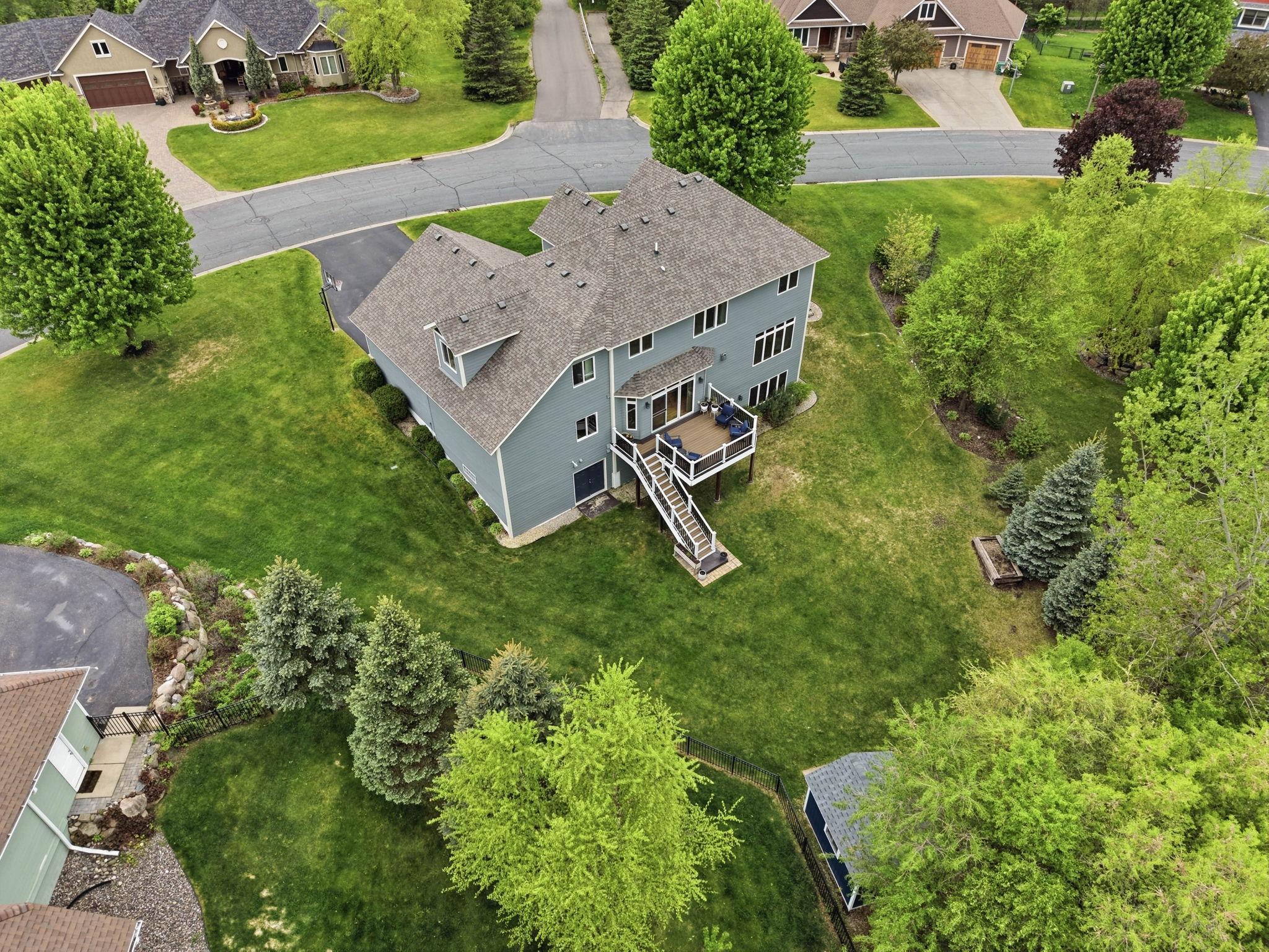 Back of home faces tall and mature trees for amazing natural privacy