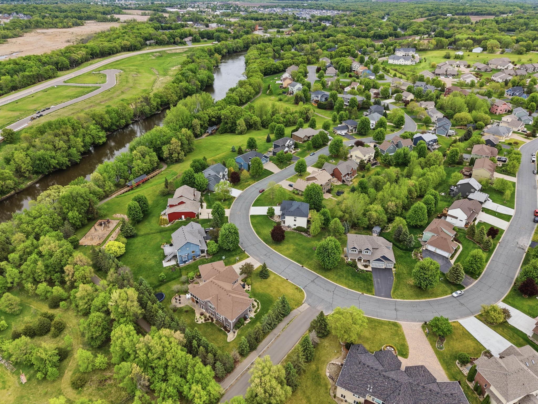 Walk across the street to catch the walking trail down to the playground and Crow River