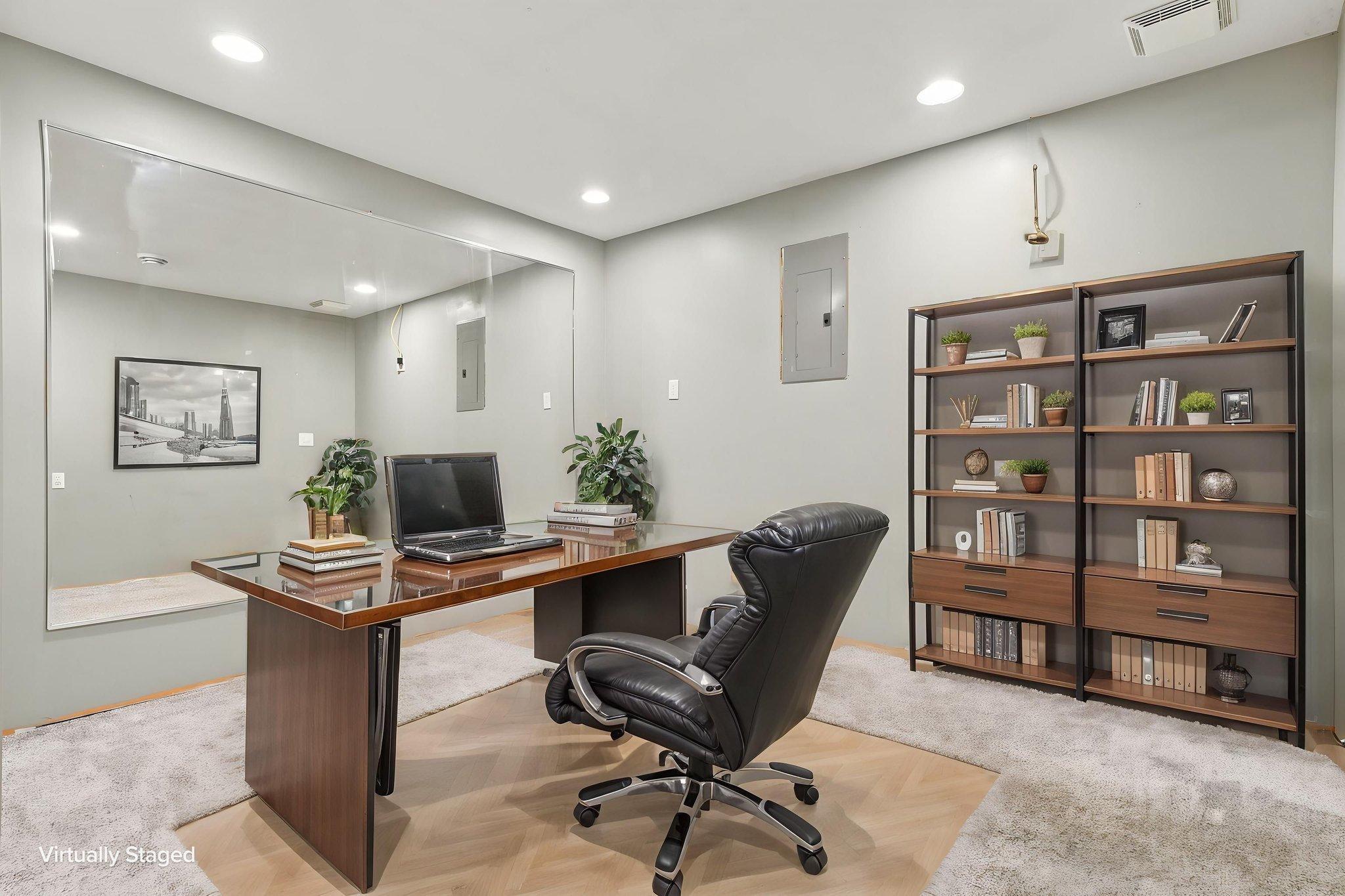 Virtually staged lower level non-conforming 6th bedroom.