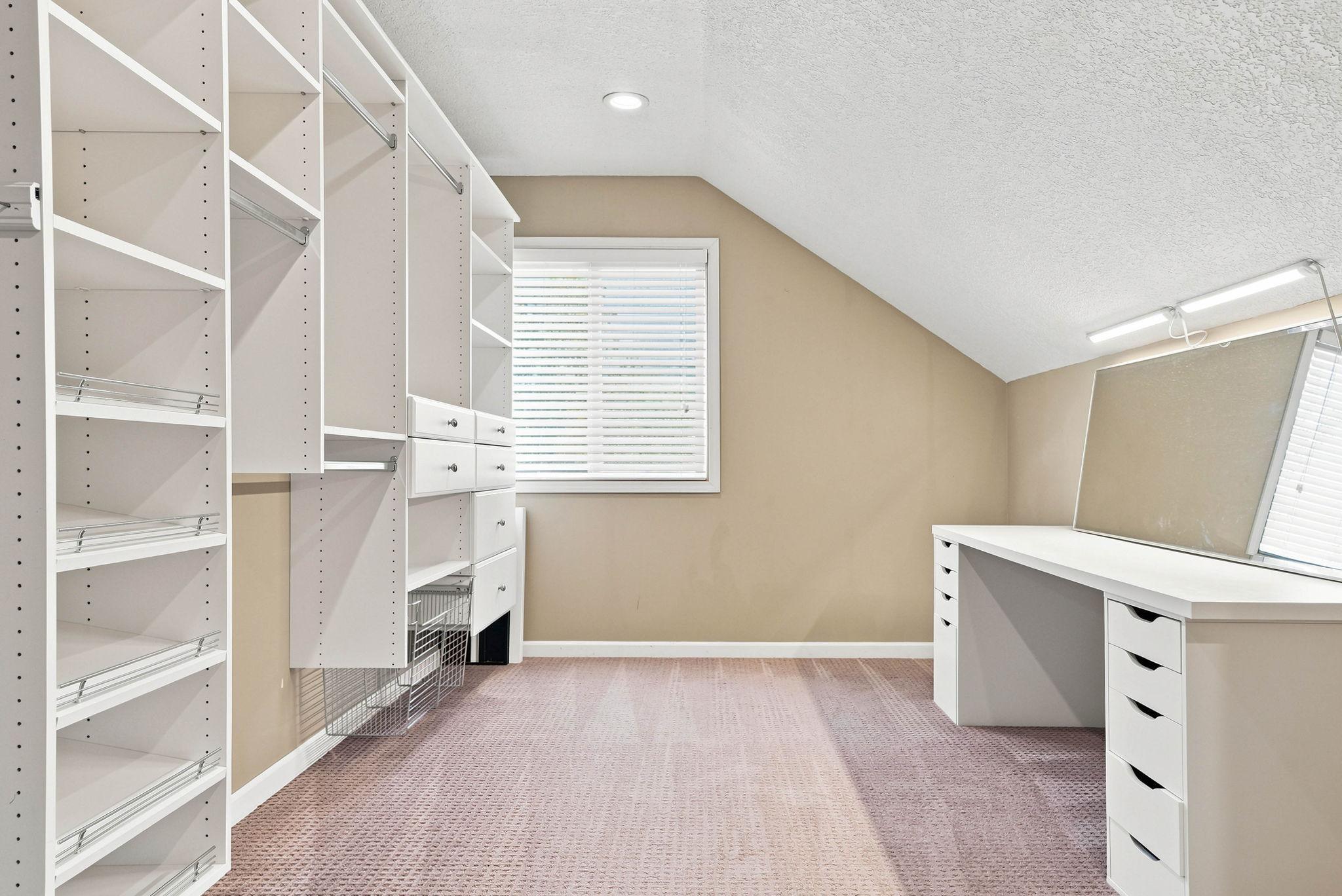 4th section of the walk in closet and private vanity area