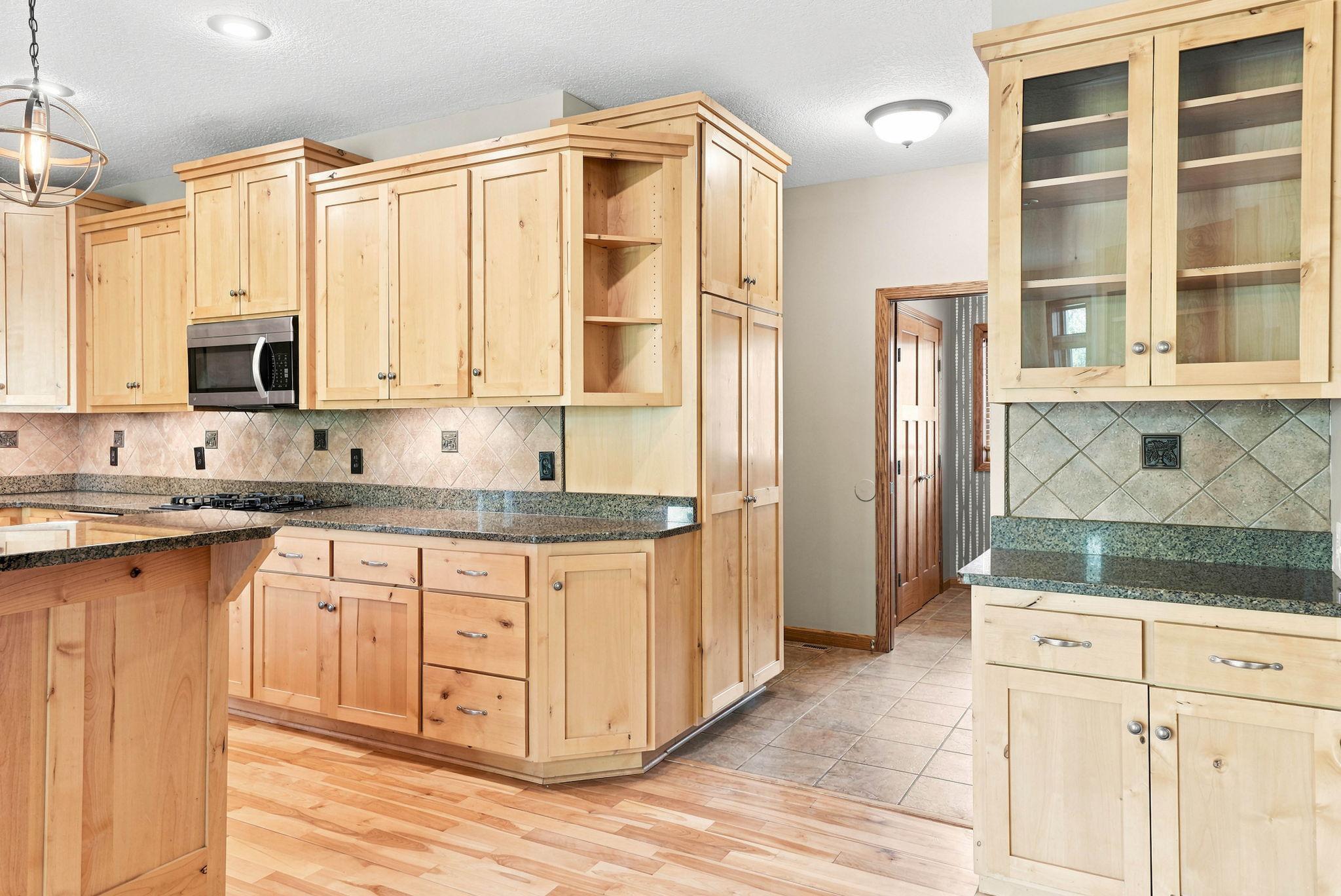 Head off the kitchen to find a mainfloor powder room, mudroom, and 1 of 2 laundry rooms