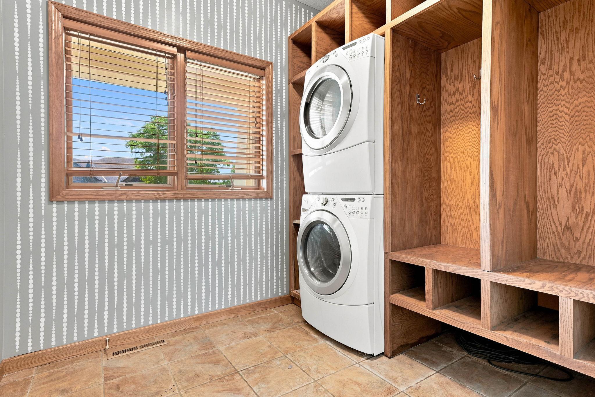 1 of 2 laundry areas with built ins