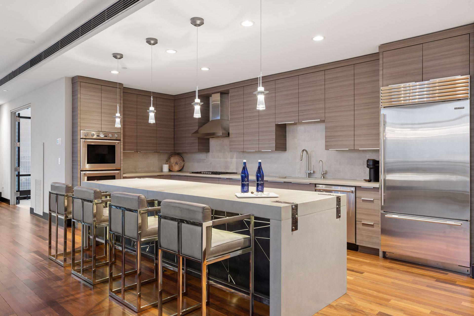 The sleek modern kitchen with professional appliances makes entertaining a joy...
