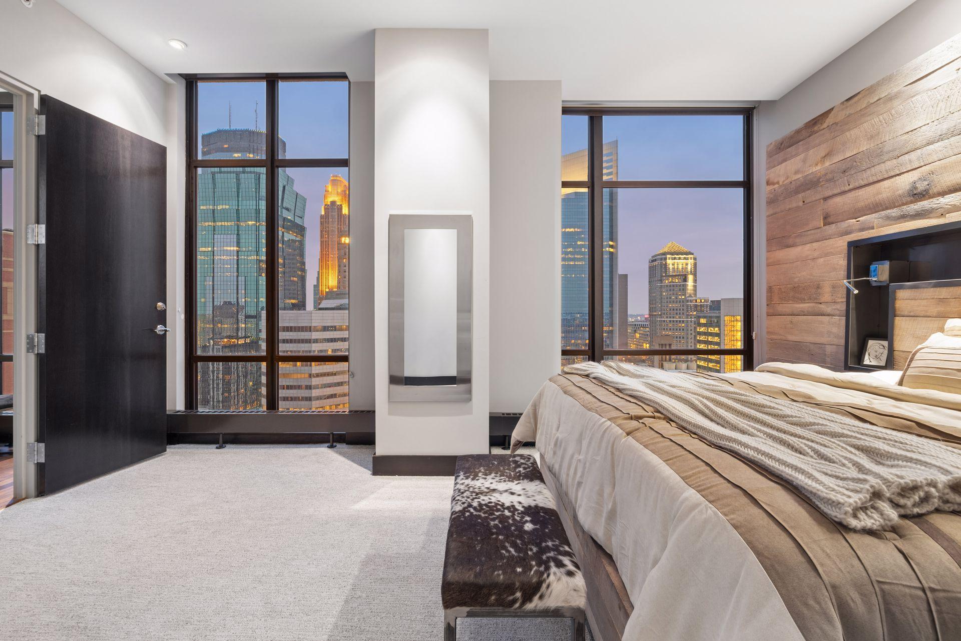 A second ensuite bedroom anchors the opposite end of the condo.