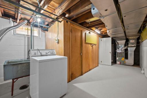 Note the large storage closet behind the door in this photo