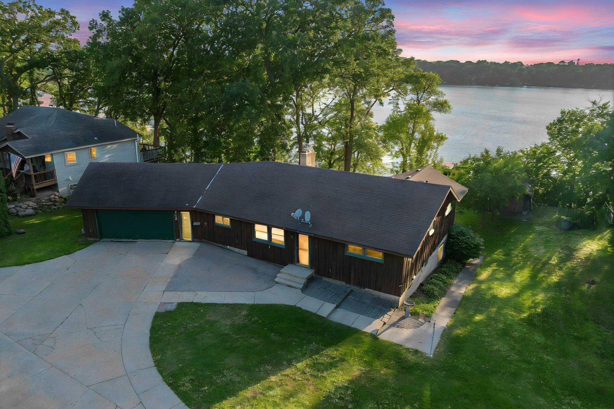 350 Amber Lake Rd Fairmont MN-01 day to dusk.jpeg