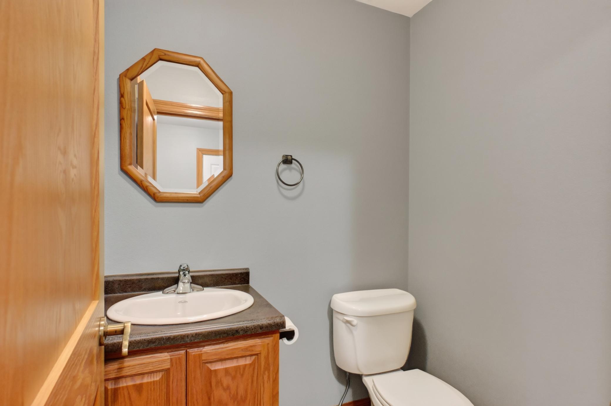 Main Level Half bath off of Garage