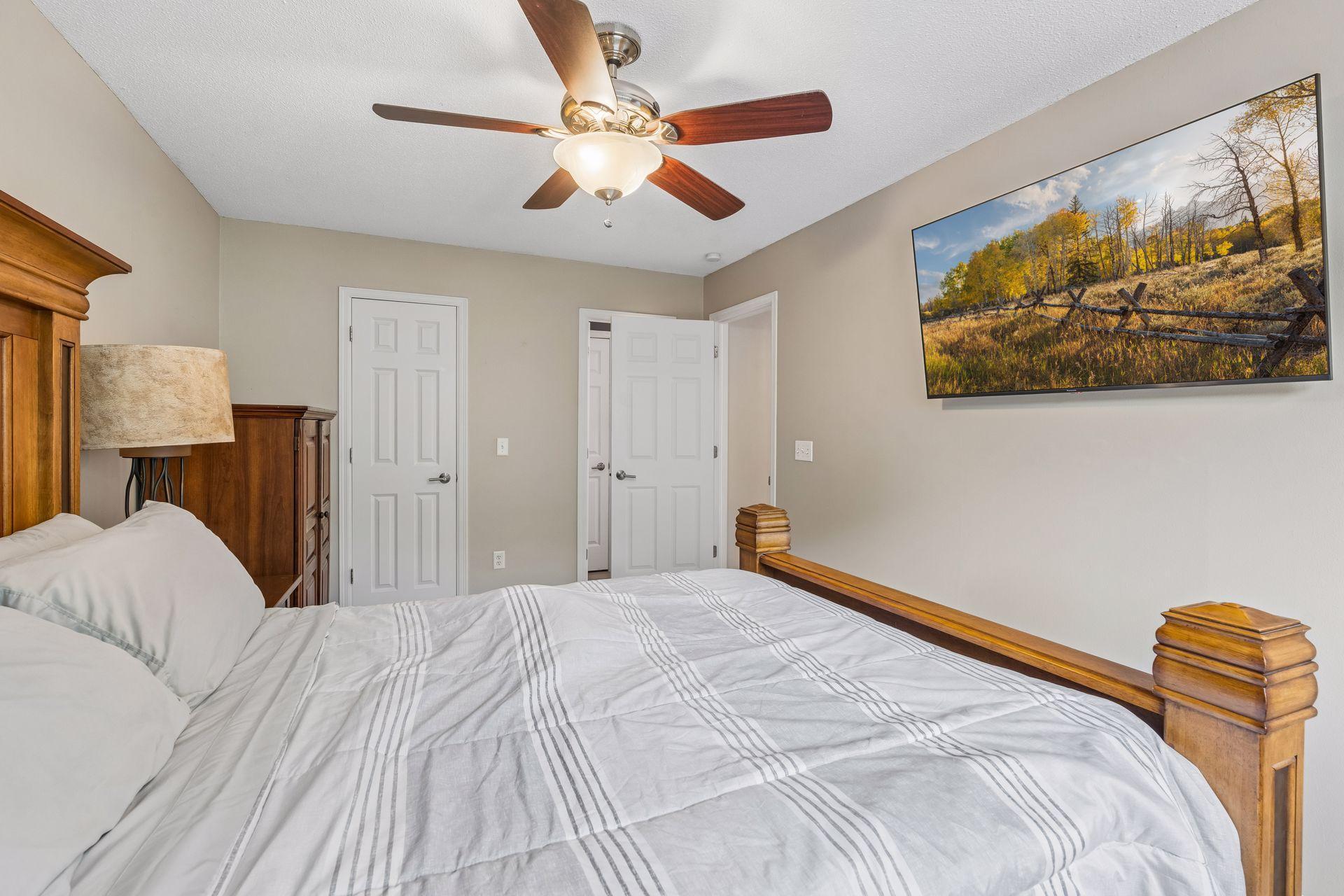 Walk in closet and walk through to upper full bathroom