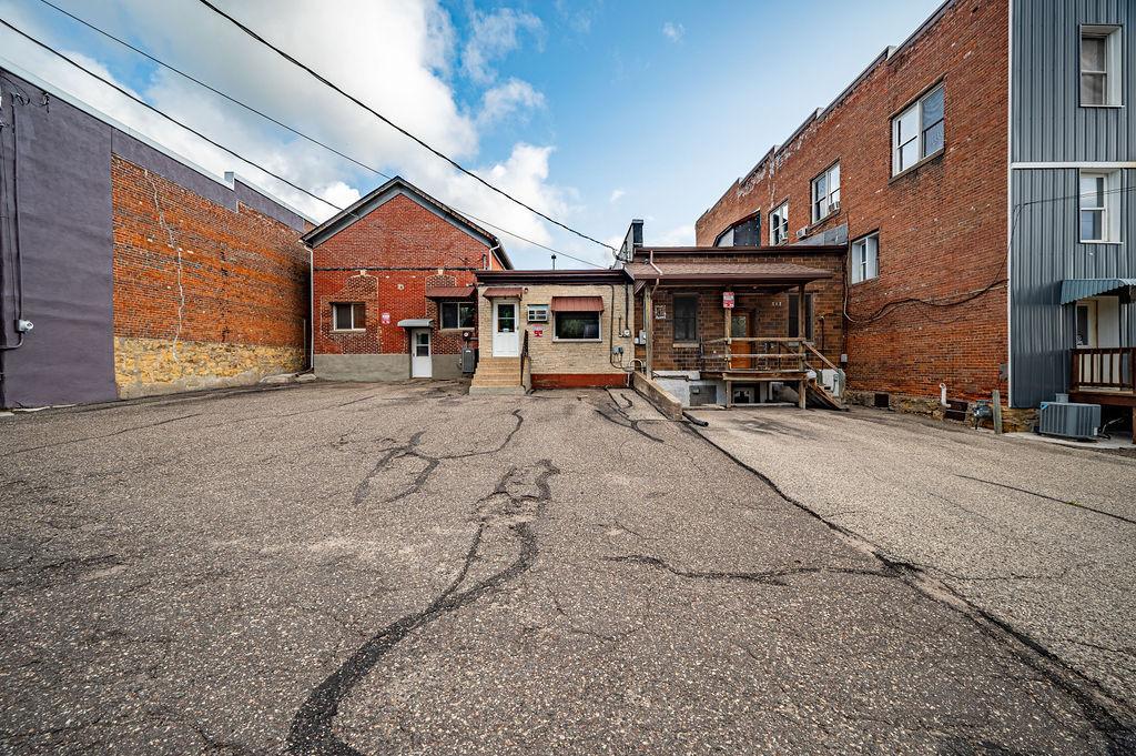 Back Entrances & Paved Lot