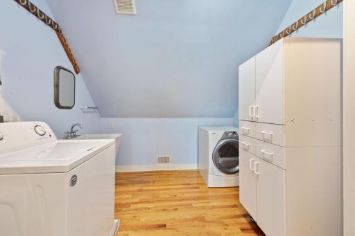 Laundry is upstairs next to primary bedroom.