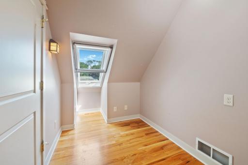 Bedroom 2 is a small cozy space for a twin bed, bunk bed or use as an office. Closet on the left.