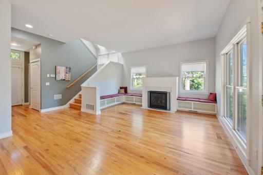 Additional living room view showing the built in benches for extra seating or a reading nook.