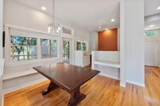 The dining area off the living room and kitchen area is the perfect place to gather for meals.