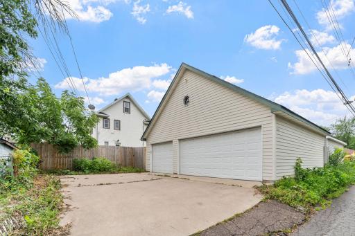 With a GIANT newer garage with attic!