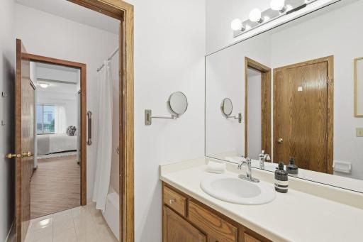 Full bath with a pocket door to close off the shower when guests are there.