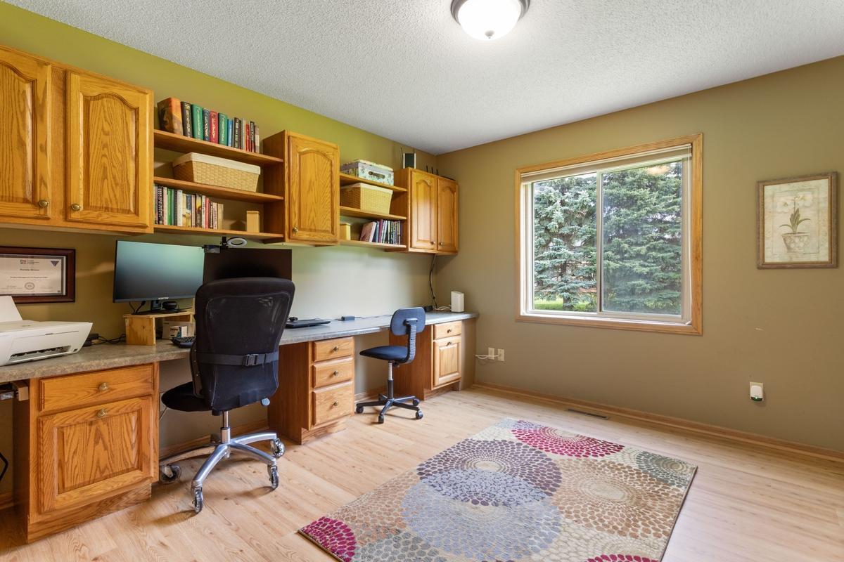 Main floor Bedroom - built-ins make a great office too
