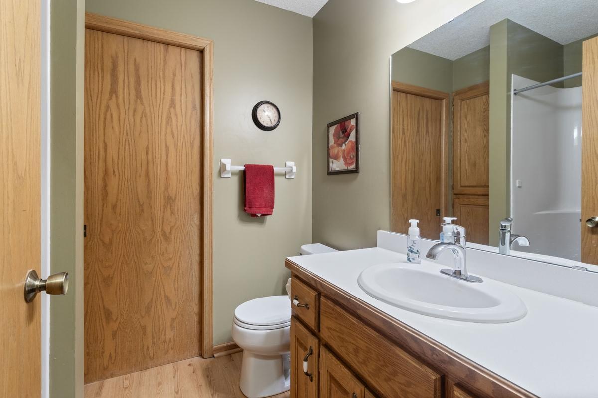 3/4 with shower across from main level bedroom