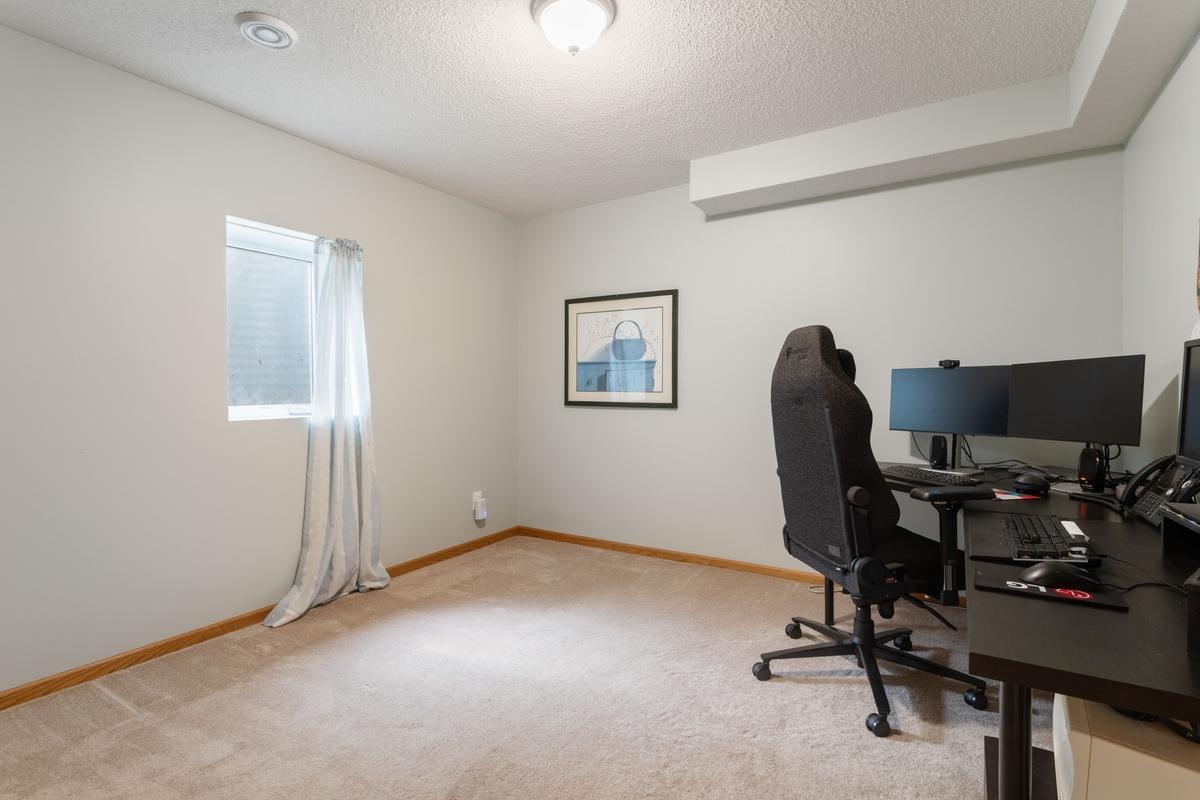 Lower level 5th bedroom offers a variety of uses