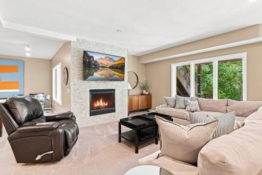 Lower level family room with gas fireplace