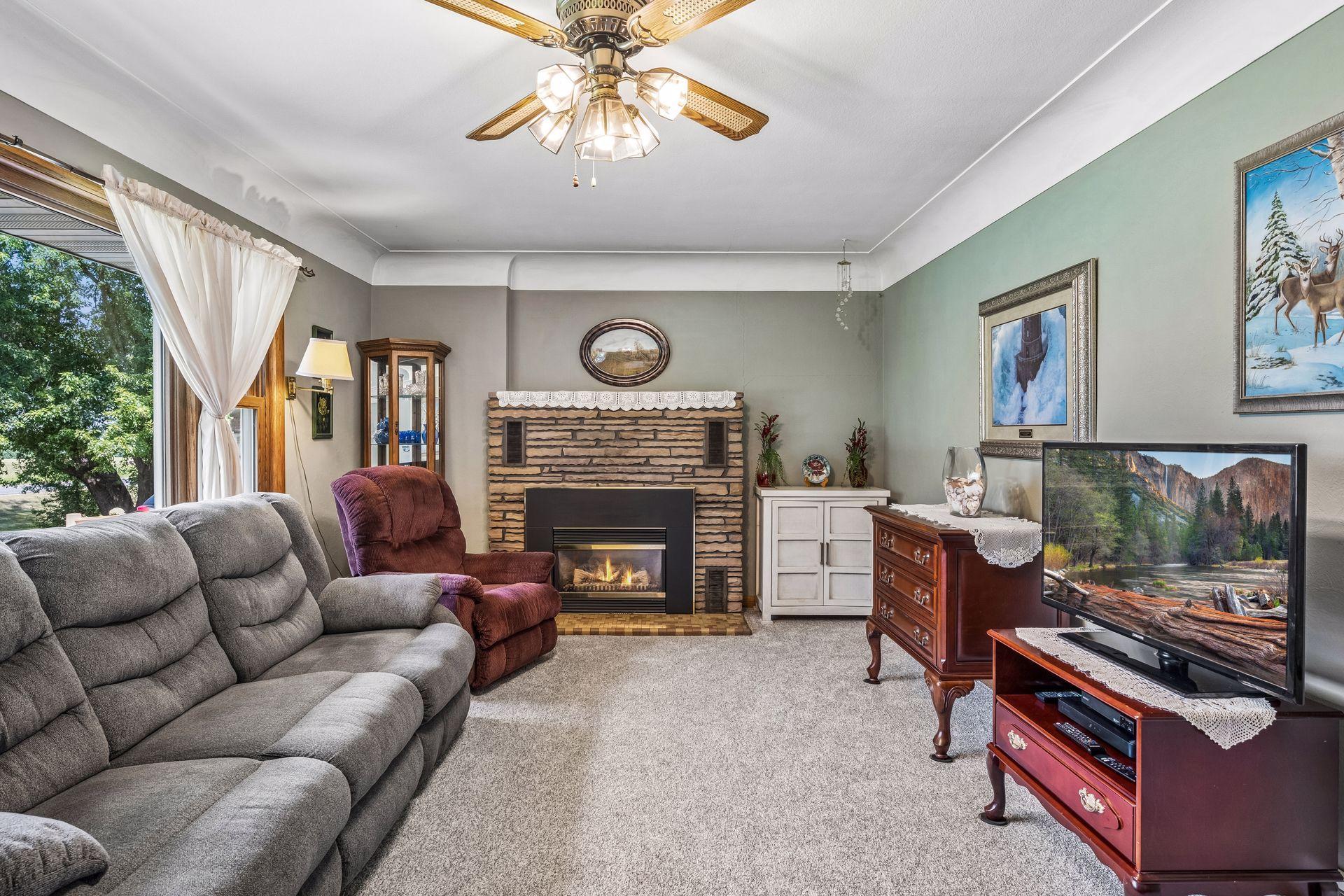 Gas fireplace gives this room a cozy feeling on cool nights.