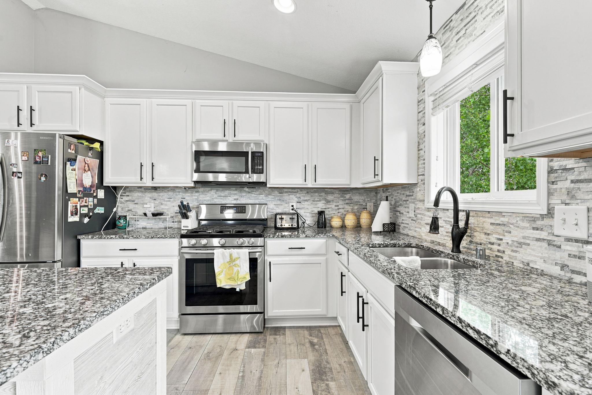 Beautiful Kitchen with a Functional Layout and Stainless Steel Appliances