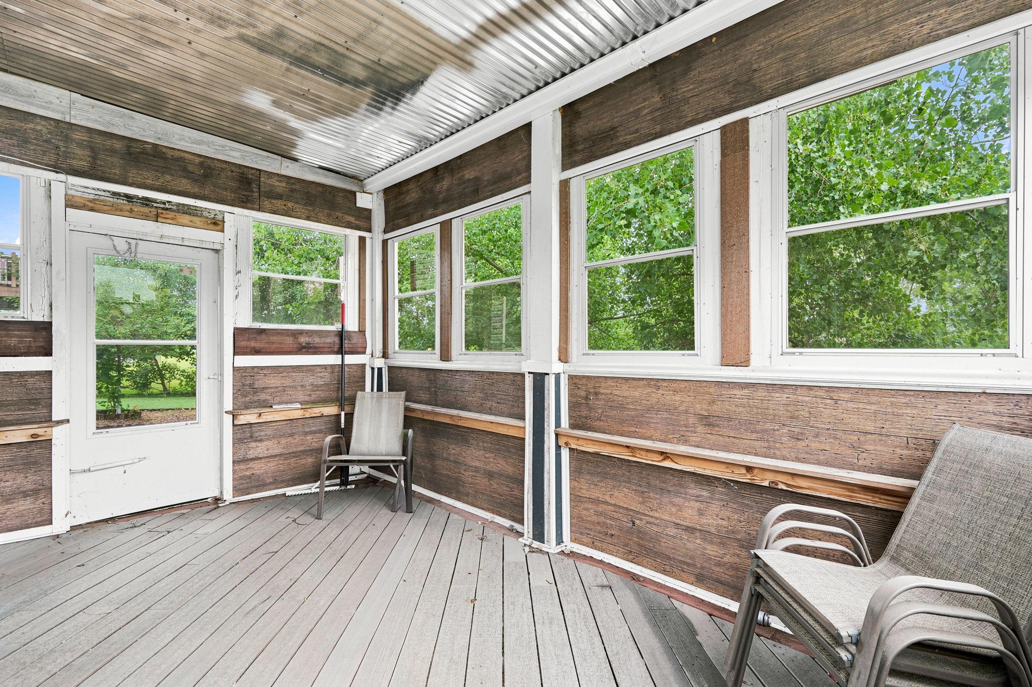 Relax and Unwind in the Inviting 3-Season Porch