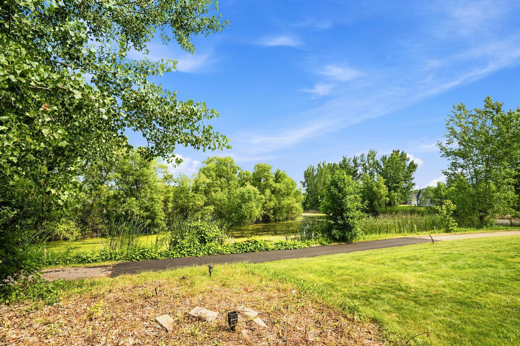 Beautifully Designed Backyard with Multiple Entertaining Spaces