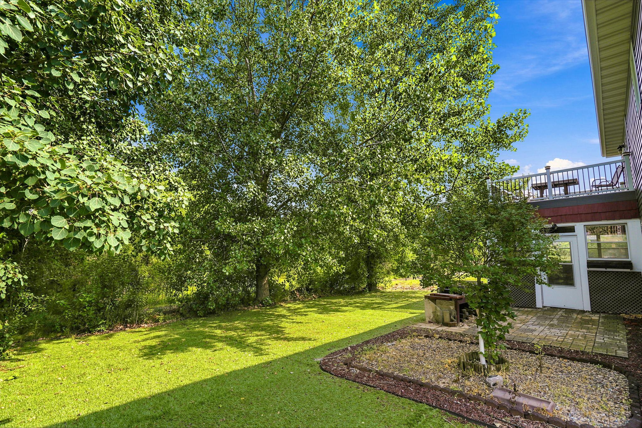 Beautifully Designed Backyard with Multiple Entertaining Spaces