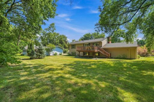 Nice flat back yard with mature trees