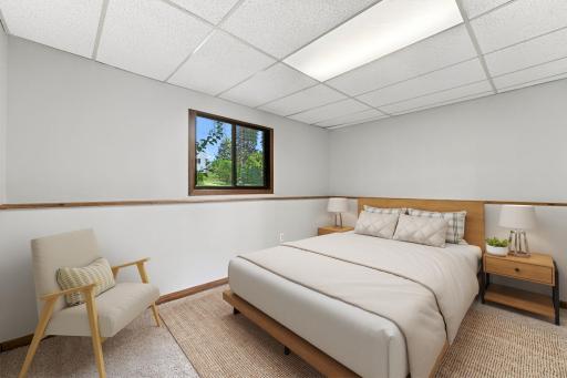 Virtually staged lower level bedroom