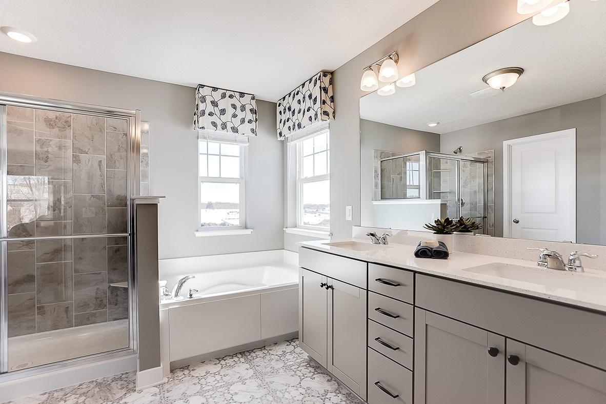Primary suite bathroom with separate tub/shower!
