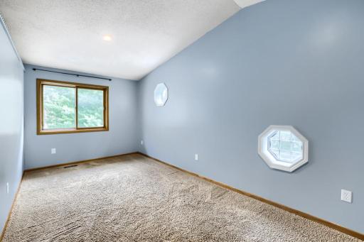 1 of 3 upper-level bedrooms