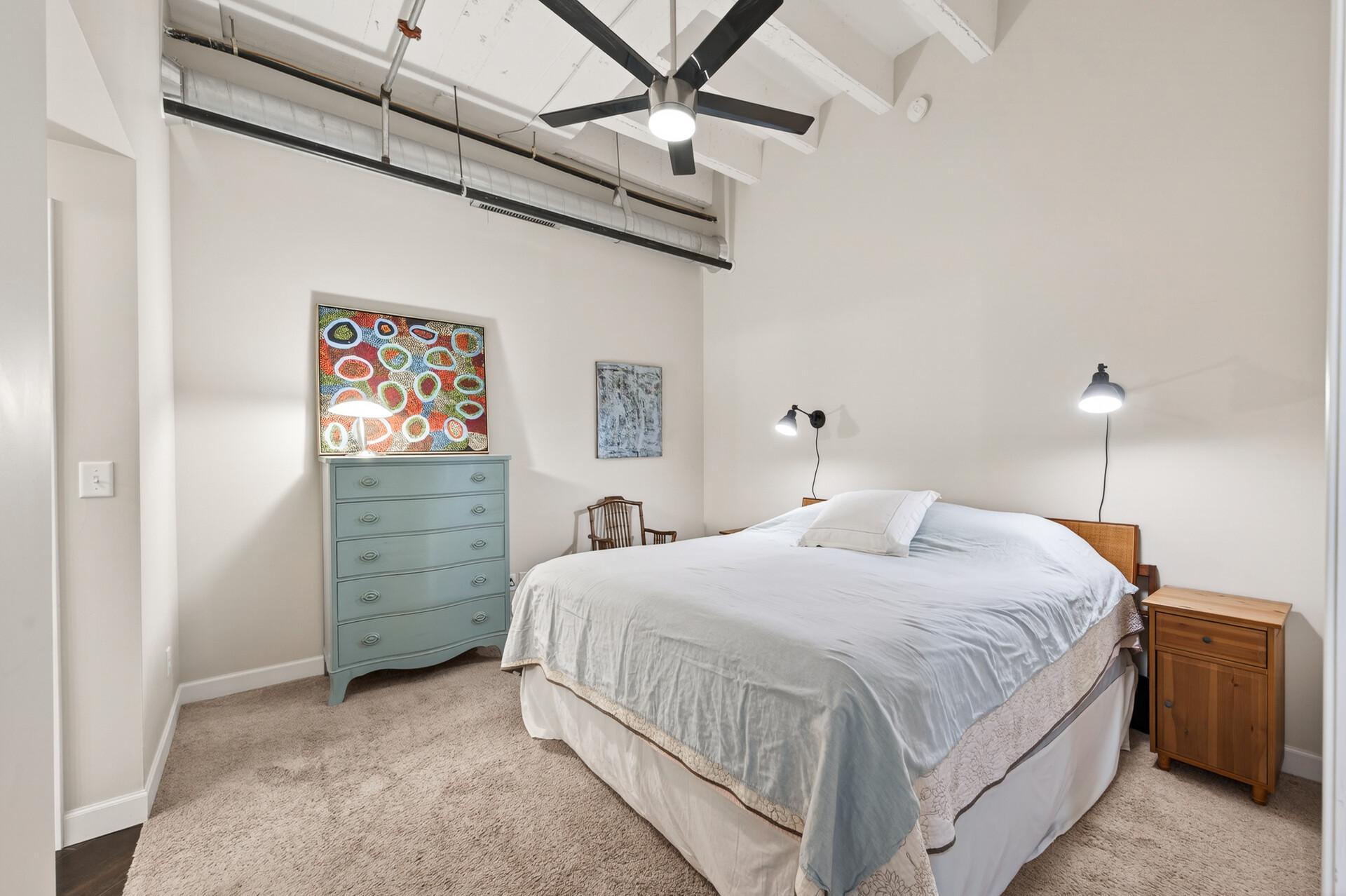 Entering the spacious main bedroom with walk in closet.