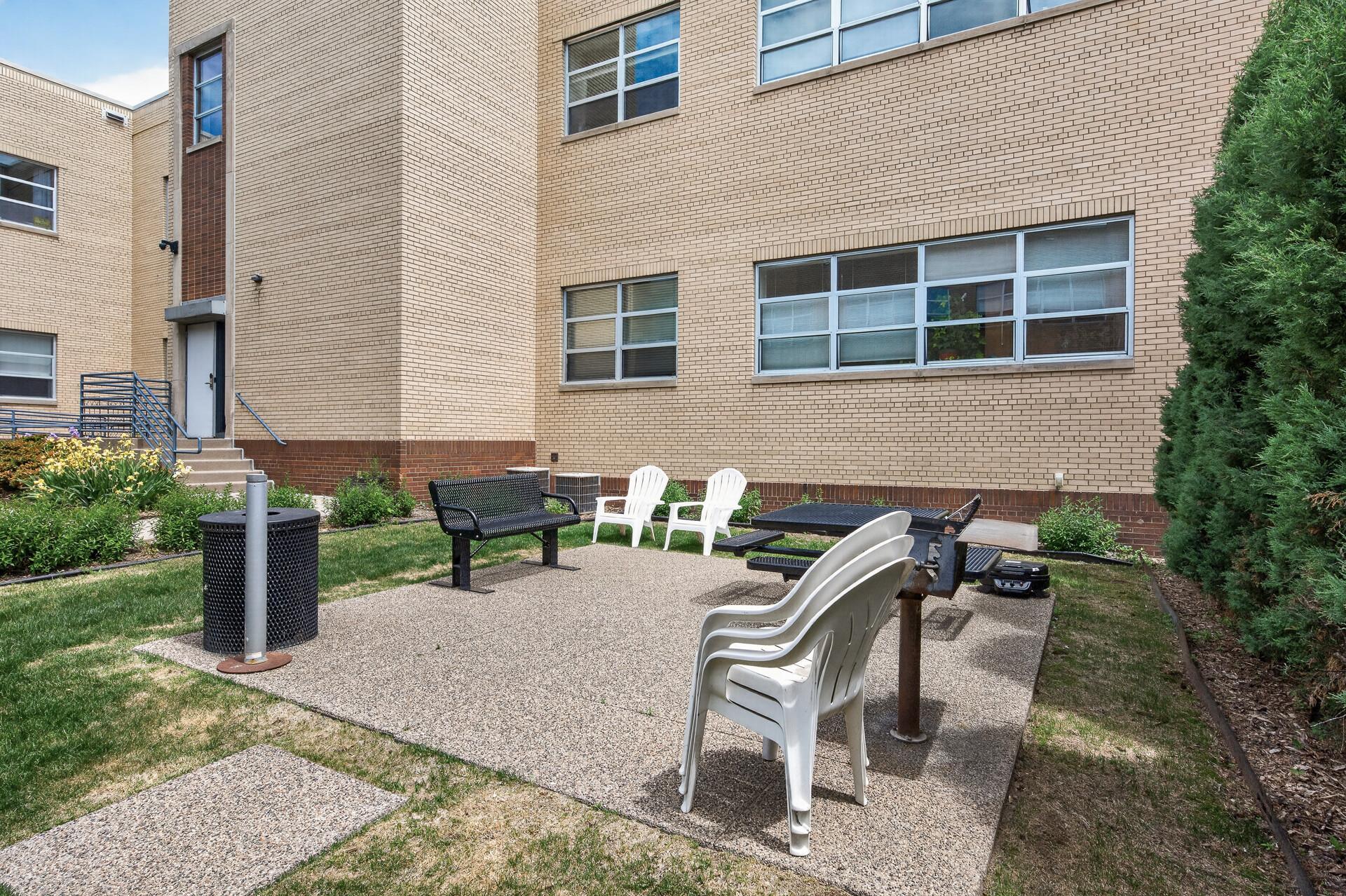 Views from the back of the main building showcasing one of two outdoor gathering areas.