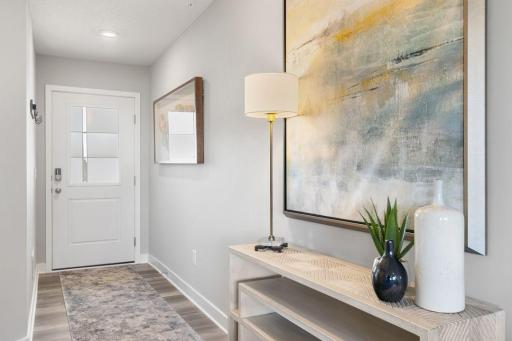 Wide entry way into the home! Photo is of model home. Colors and options may vary. Ask Sales Agent for details.