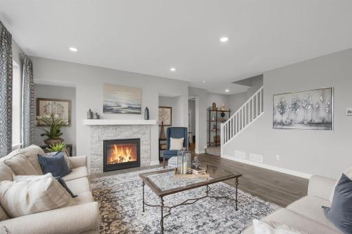 Cozy up next to your gas fireplace with a good book on a chilly day/evening (colors and options may vary).