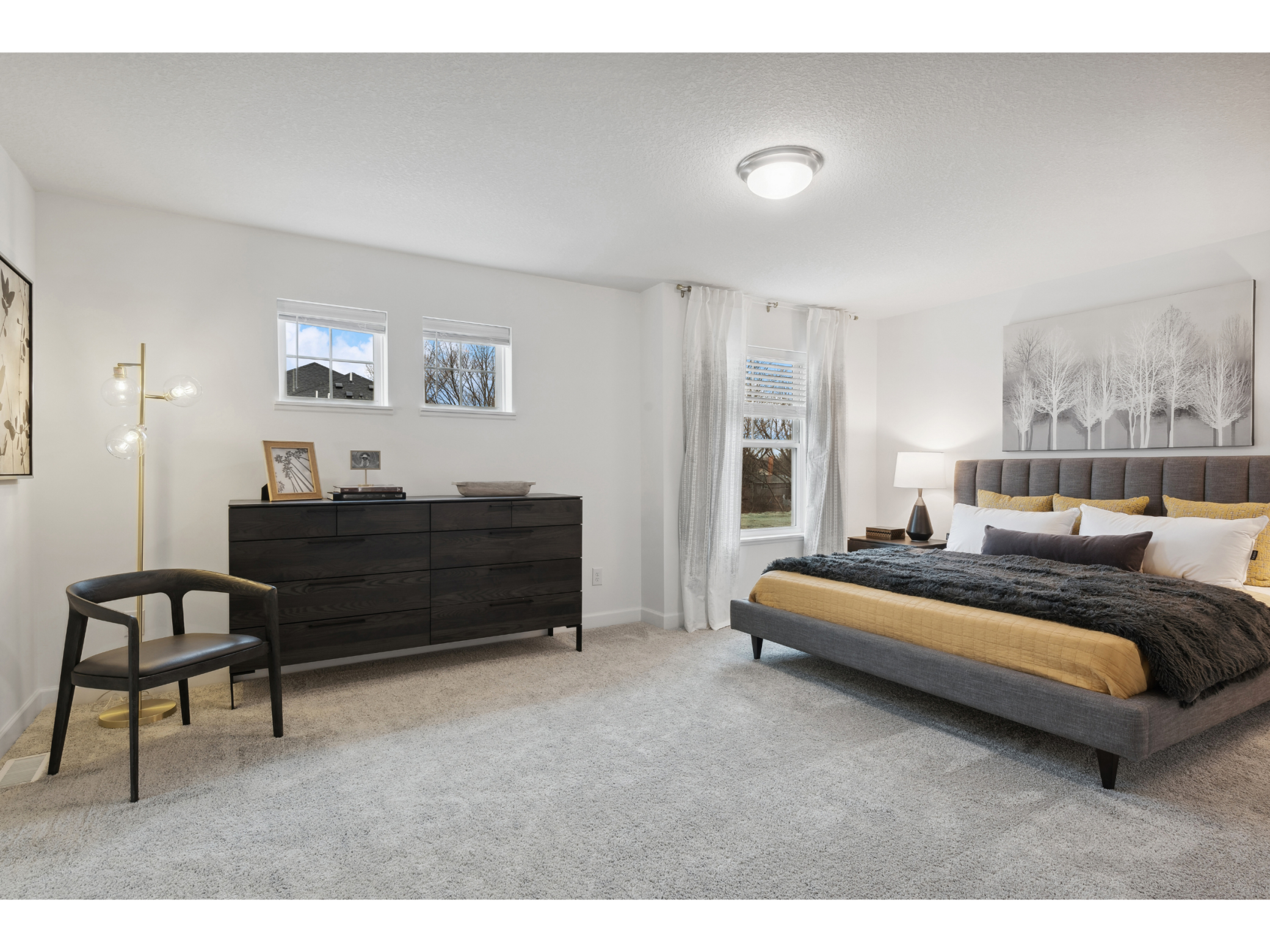 (Photo of a decorated model, actual homes finishes will vary) Find your retreat in this stunning owner's suite. Enjoy the exclusivity of a private bath and huge walk-in closet.