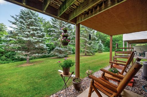 The patio off the family room is a nice space to enjoy the privacy.