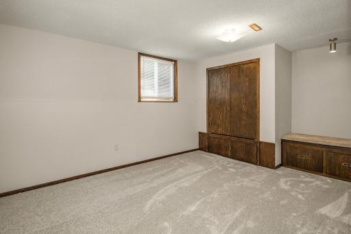 Lower level bedroom complete with extra cubby storage
