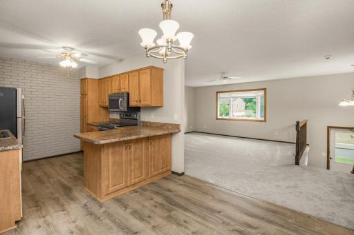 Flow into the dining area and kitchen seamlessly from your sunny living room